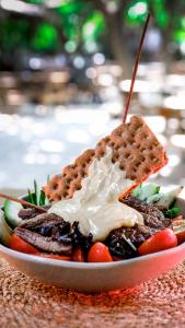 a plate of food with a sandwich on a table at Sheriff, Olympos in Kumluca