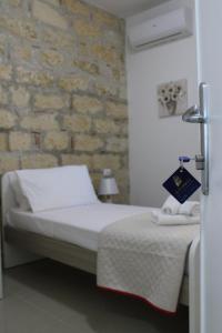 Postel nebo postele na pokoji v ubytování B&B Marco Polo