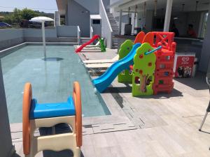 The swimming pool at or close to Amaltheia Beachfront Villas