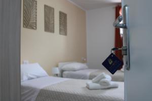 Postel nebo postele na pokoji v ubytování B&B Marco Polo