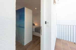 Postel nebo postele na pokoji v ubytování Apartamentos Santa María 15