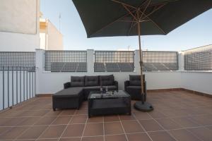 Posezení v ubytování Apartamentos Santa María 15