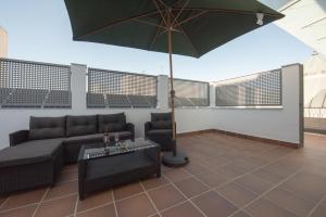 Posezení v ubytování Apartamentos Santa María 15