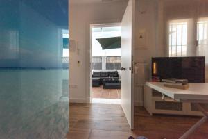 TV a/nebo společenská místnost v ubytování Apartamentos Santa María 15