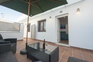 Posezení v ubytování Apartamentos Santa María 15