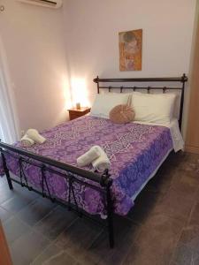 Ένα ή περισσότερα κρεβάτια σε δωμάτιο στο Ranias cozy apartment university