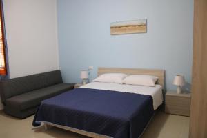Postel nebo postele na pokoji v ubytování B&B Marco Polo
