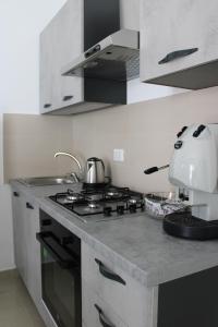 Kuchyň nebo kuchyňský kout v ubytování B&B Marco Polo