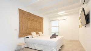 TV a/nebo společenská místnost v ubytování Ereta Rooms Habitaciones baño privado