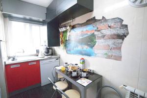 Kuchyňa alebo kuchynka v ubytovaní El apartamento de Santa Emilia by Just Room