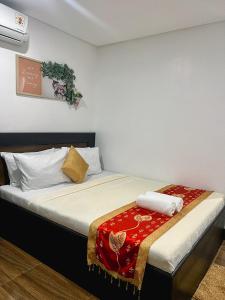 Postel nebo postele na pokoji v ubytování Island Wanderers Inn