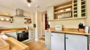 Köök või kööginurk majutusasutuses Cosy Cottage