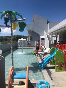 The swimming pool at or close to Amaltheia Beachfront Villas
