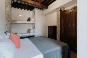 Voodi või voodid majutusasutuse Le stanze del Piccadilly toas