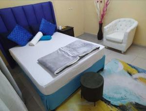 Postel nebo postele na pokoji v ubytování Creg Guest House Rustenburg