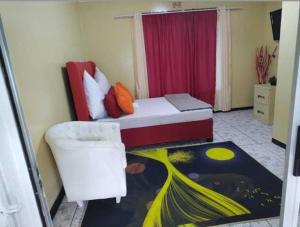 Postel nebo postele na pokoji v ubytování Creg Guest House Rustenburg