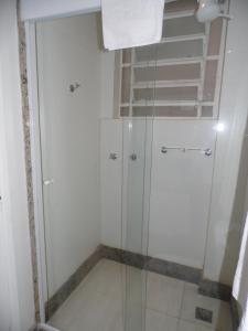 a bathroom with a shower stall and a walk in shower at Atlântico Centro Apartments in Rio de Janeiro