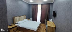 TV a/nebo společenská místnost v ubytování Very Well Guest House