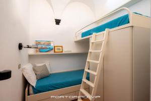 Postel nebo postele na pokoji v ubytování Papù 2 by PortofinoVip