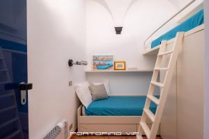 Postel nebo postele na pokoji v ubytování Papù 2 by PortofinoVip