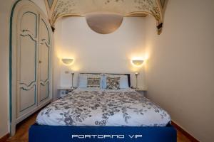 Postel nebo postele na pokoji v ubytování Papù 2 by PortofinoVip