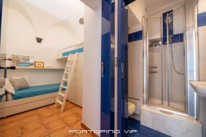 Postel nebo postele na pokoji v ubytování Papù 2 by PortofinoVip