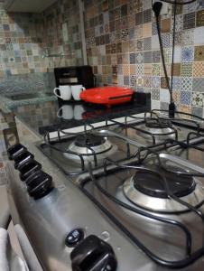 Kuchyň nebo kuchyňský kout v ubytování Apartamento Aconchegante em Paulo Afonso