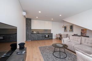 Kuhinja oz. manjša kuhinja v nastanitvi Spaciuos 1 BD Apt by Domvia