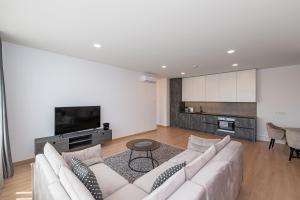 Kuhinja oz. manjša kuhinja v nastanitvi Spaciuos 1 BD Apt by Domvia