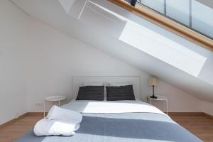 Postelja oz. postelje v sobi nastanitve Spaciuos 1 BD Apt by Domvia