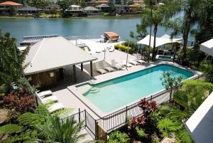 an overhead view of a swimming pool in a resort at Moorings On Cavill Surfers Paradise in Gold Coast