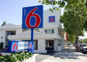 a sign in front of a building with a number six at Motel 6-San Jose, CA - Convention Center in San Jose