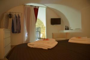 Ein Bett oder Betten in einem Zimmer der Unterkunft Vittorini