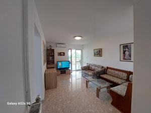 Una televisión o centro de entretenimiento en Sophie apartman