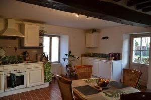 Nhà bếp/bếp nhỏ tại La Petite Ferme