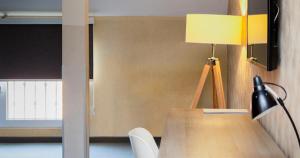 Een TV en/of entertainmentcenter bij Garni Hotel Mint
