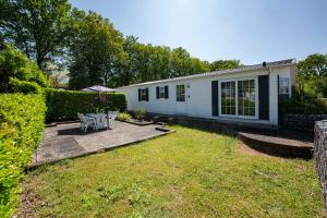 En have udenfor 79, Ruime chalet aan de Kampina