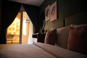 Voodi või voodid majutusasutuse Jasmine Pyramids Hotel toas