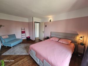 Postel nebo postele na pokoji v ubytování Le Moulin en Route 2