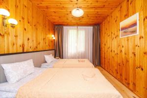 Voodi või voodid majutusasutuse Sovinyon Resort toas