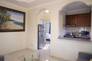 Kuchyň nebo kuchyňský kout v ubytování Villa Gumio 2BR Apt -7min walk Boca Chica Beach apts