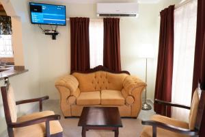 Posezení v ubytování Villa Gumio 2BR Apt- 7 min walk to Boca Chica Beach apts