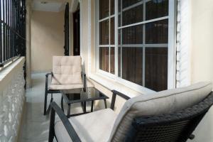 Posezení v ubytování Villa Gumio 2BR Apt- 7 min walk to Boca Chica Beach apts