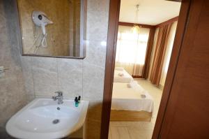 Koupelna v ubytování ŞEREF APART MOTEL + 21 fotografií
