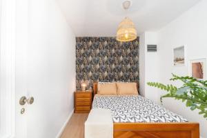 Ένα ή περισσότερα κρεβάτια σε δωμάτιο στο Casa da Quelha
