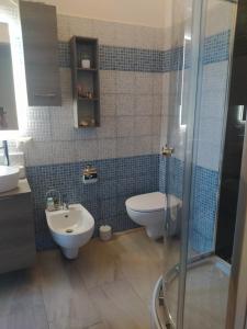 Koupelna v ubytování Casa Claudia Villasimius + 95 fotografií