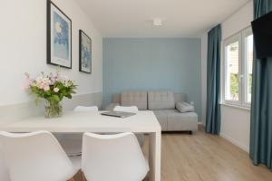 Posezení v ubytování BURSZTYN - BERNSTEIN APARTMENTS