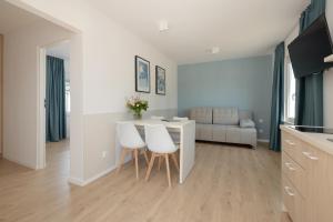 Posezení v ubytování BURSZTYN - BERNSTEIN APARTMENTS