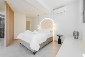 Ένα ή περισσότερα κρεβάτια σε δωμάτιο στο Gemela AllstarBoutique in Aegina Z