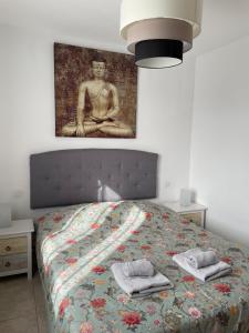 Łóżko lub łóżka w pokoju w obiekcie Casa ERNESTO